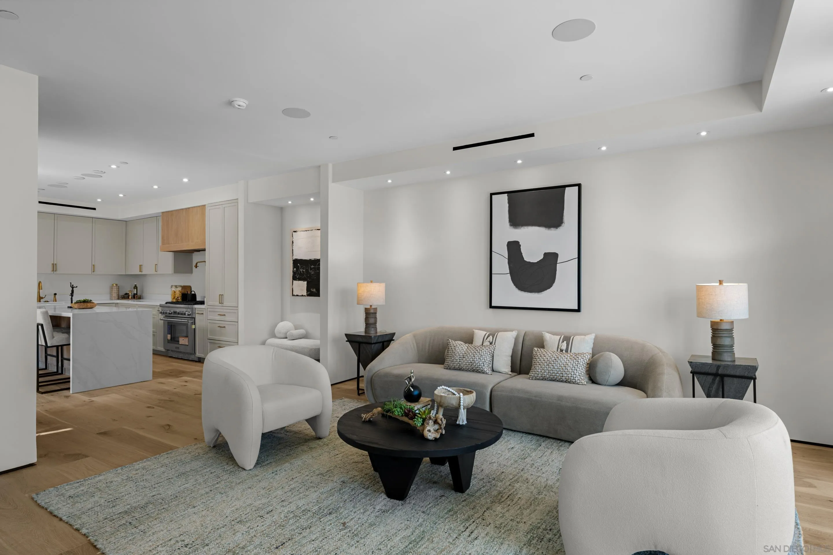 242 Playa Del Norte Street La Jolla, CA 92037 - Photo 11 of 32 a living room with furniture and white walls