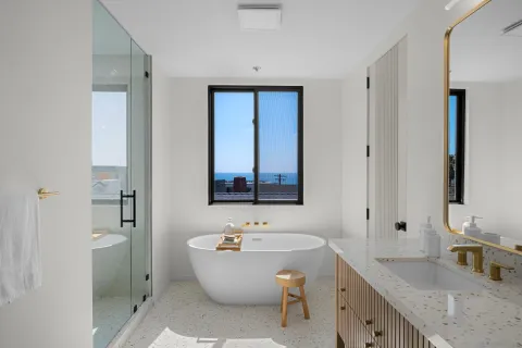 a bathroom with a double vanity sink mirror and double
