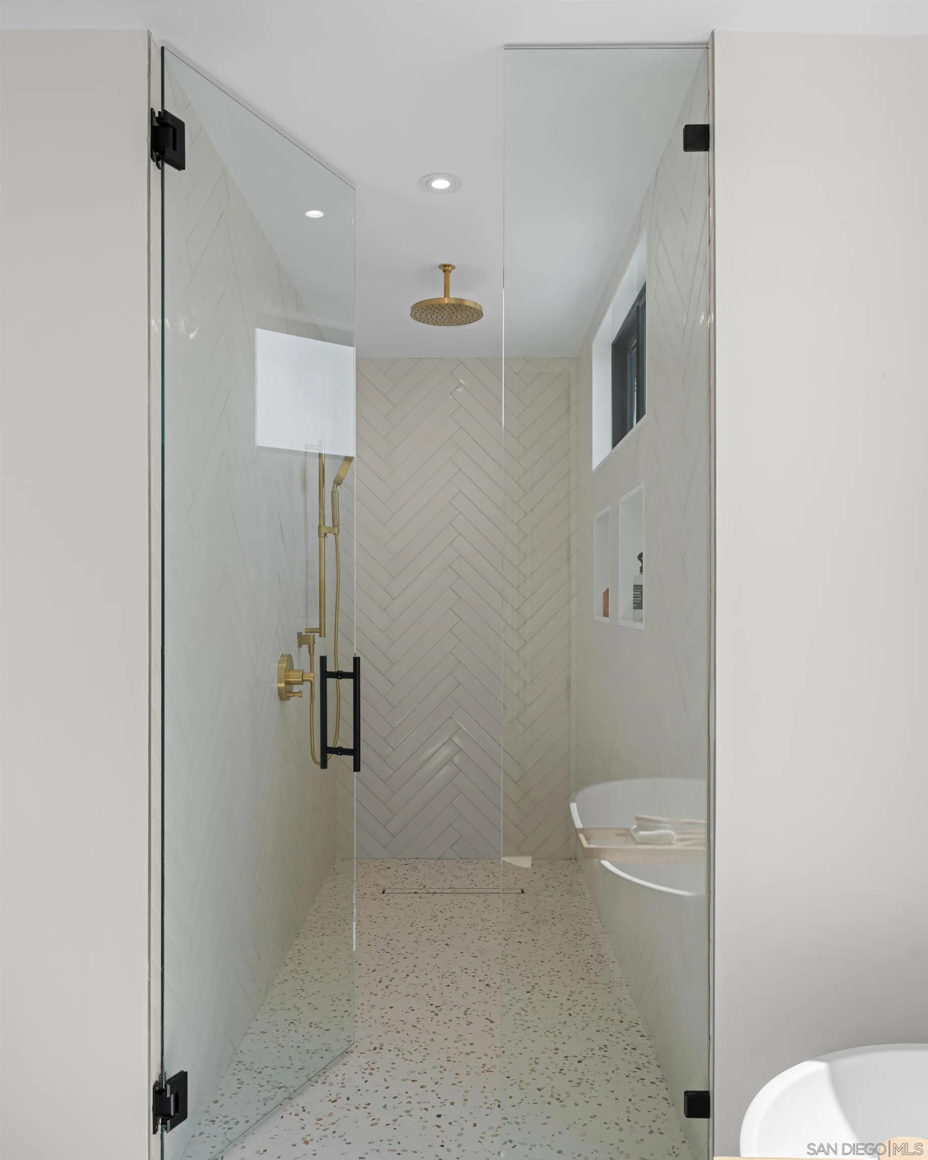 242 Playa Del Norte Street La Jolla, CA 92037 - Photo 17 of 32 a bathroom with a granite countertop toilet a sink and mirror