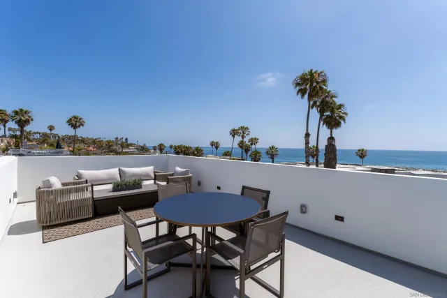 a view of a hallway with washer and dryer