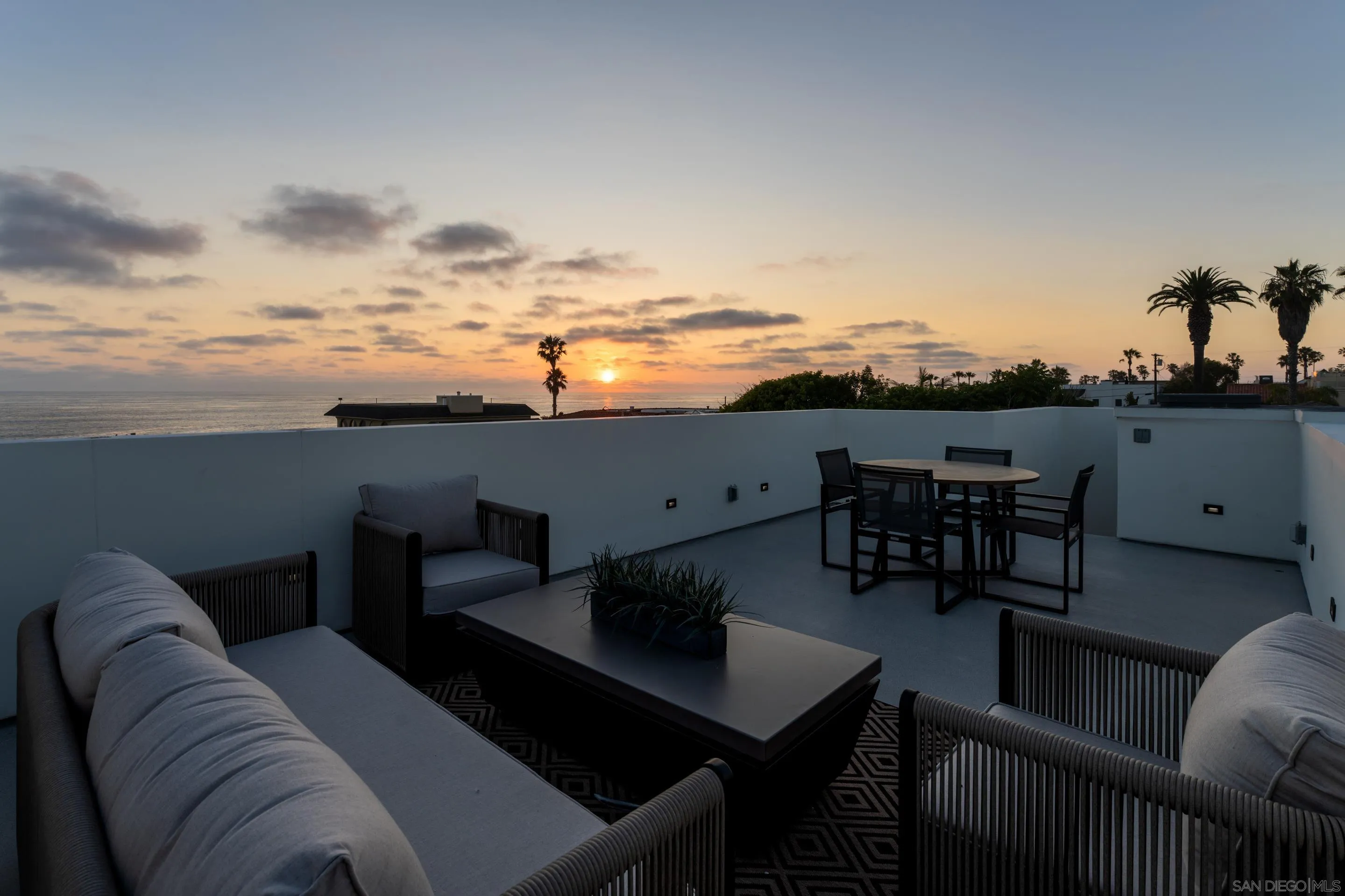 242 Playa Del Norte Street La Jolla, CA 92037 - Photo 29 of 32 a view of a terrace with couches and lounge chairs