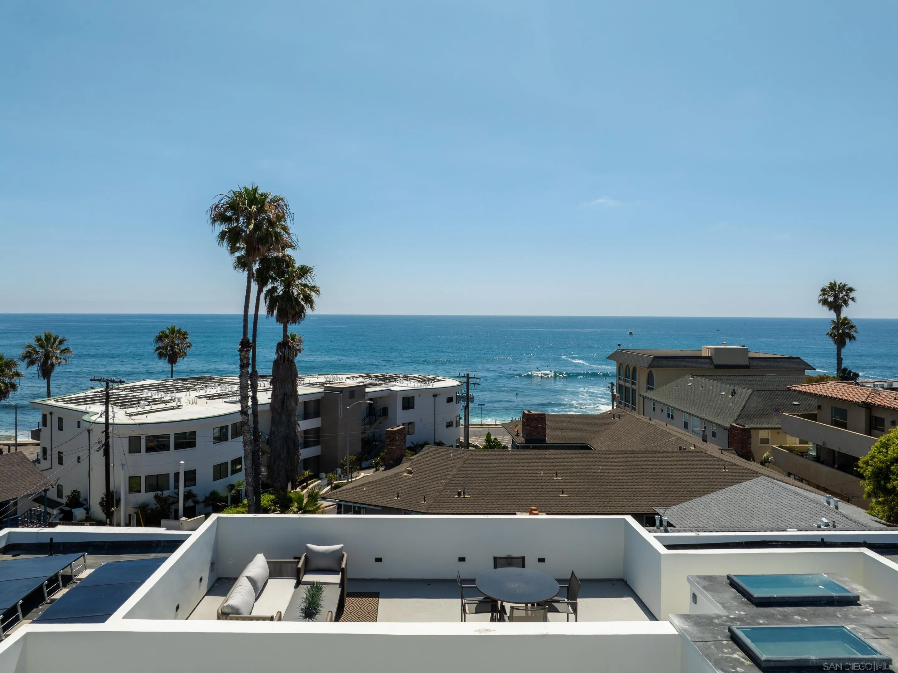 242 Playa Del Norte Street La Jolla, CA 92037 - Photo 5 of 32 an aerial view of residential houses with outdoor space and seating