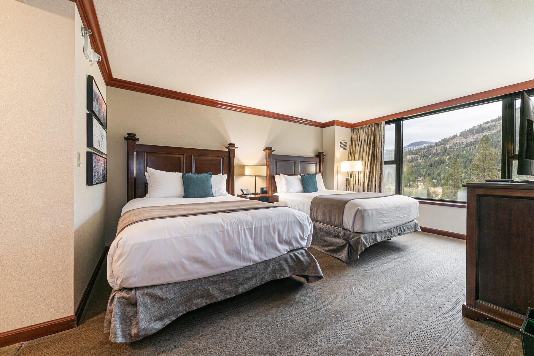 400 Resort Road, Unit 418420 Olympic Valley, CA 96146 - Photo 11 of 26 a bedroom with bed and large window