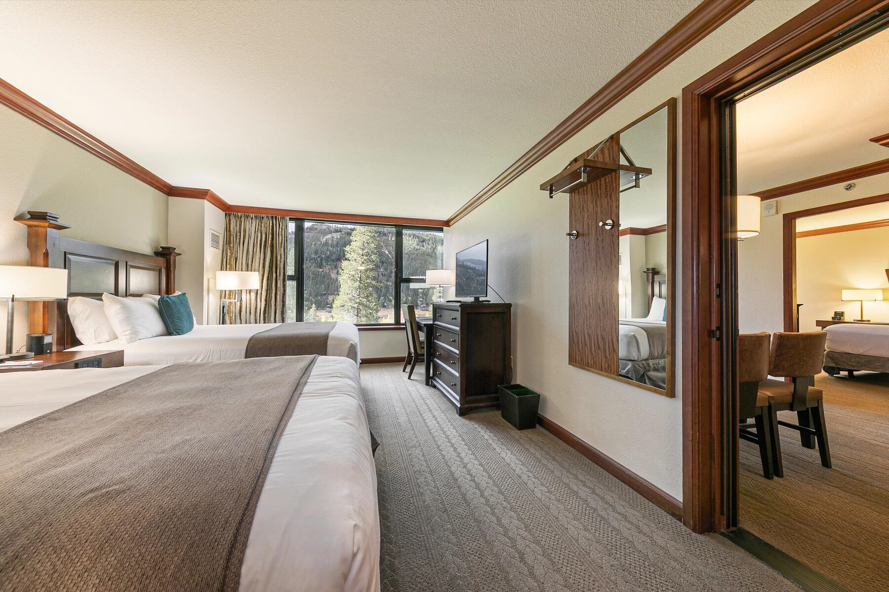 400 Resort Road, Unit 418420 Olympic Valley, CA 96146 - Photo 15 of 26 a large bedroom with a large window and a bed