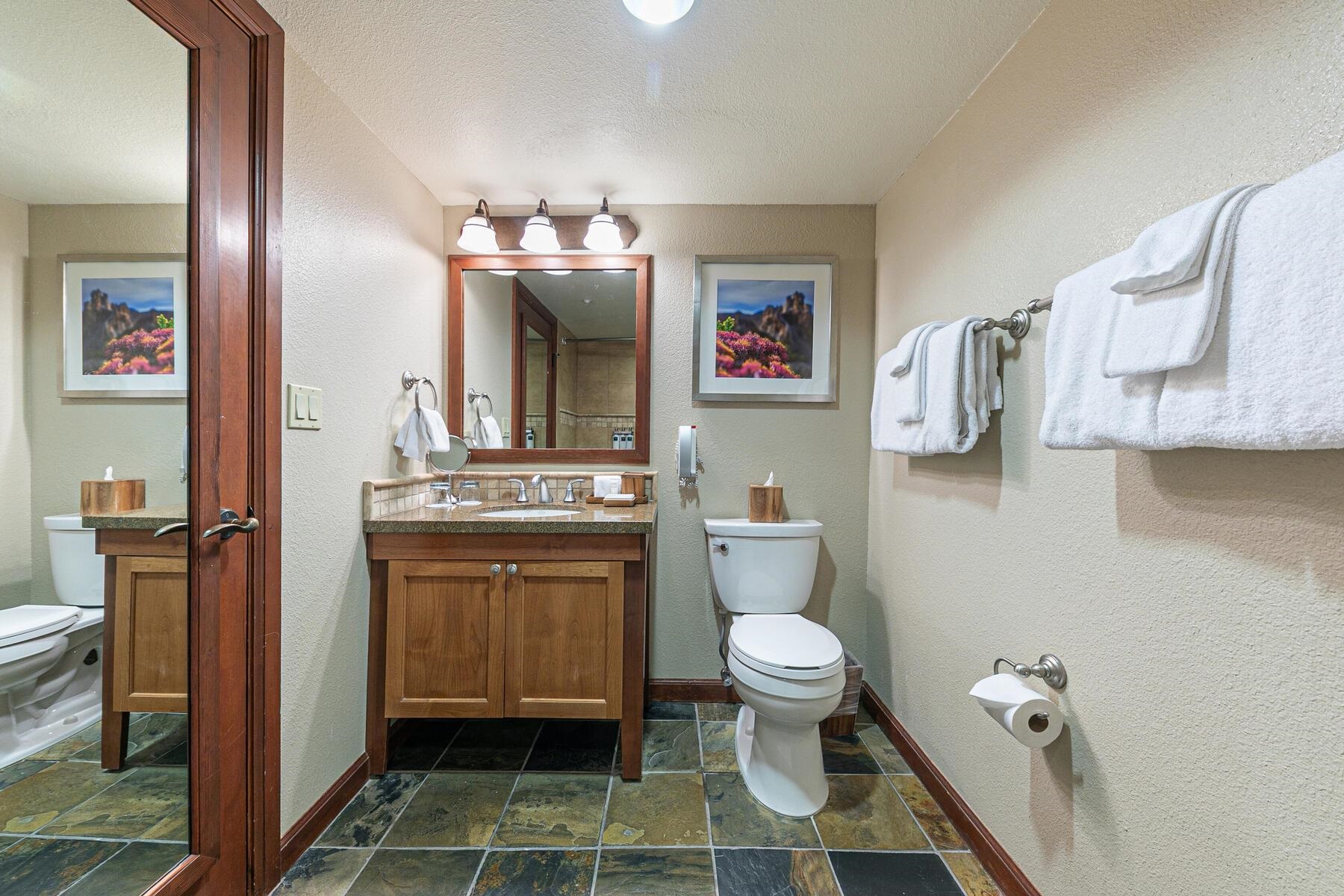 400 Resort Road, Unit 418420 Olympic Valley, CA 96146 - Photo 21 of 26 a bathroom with a toilet sink and mirror