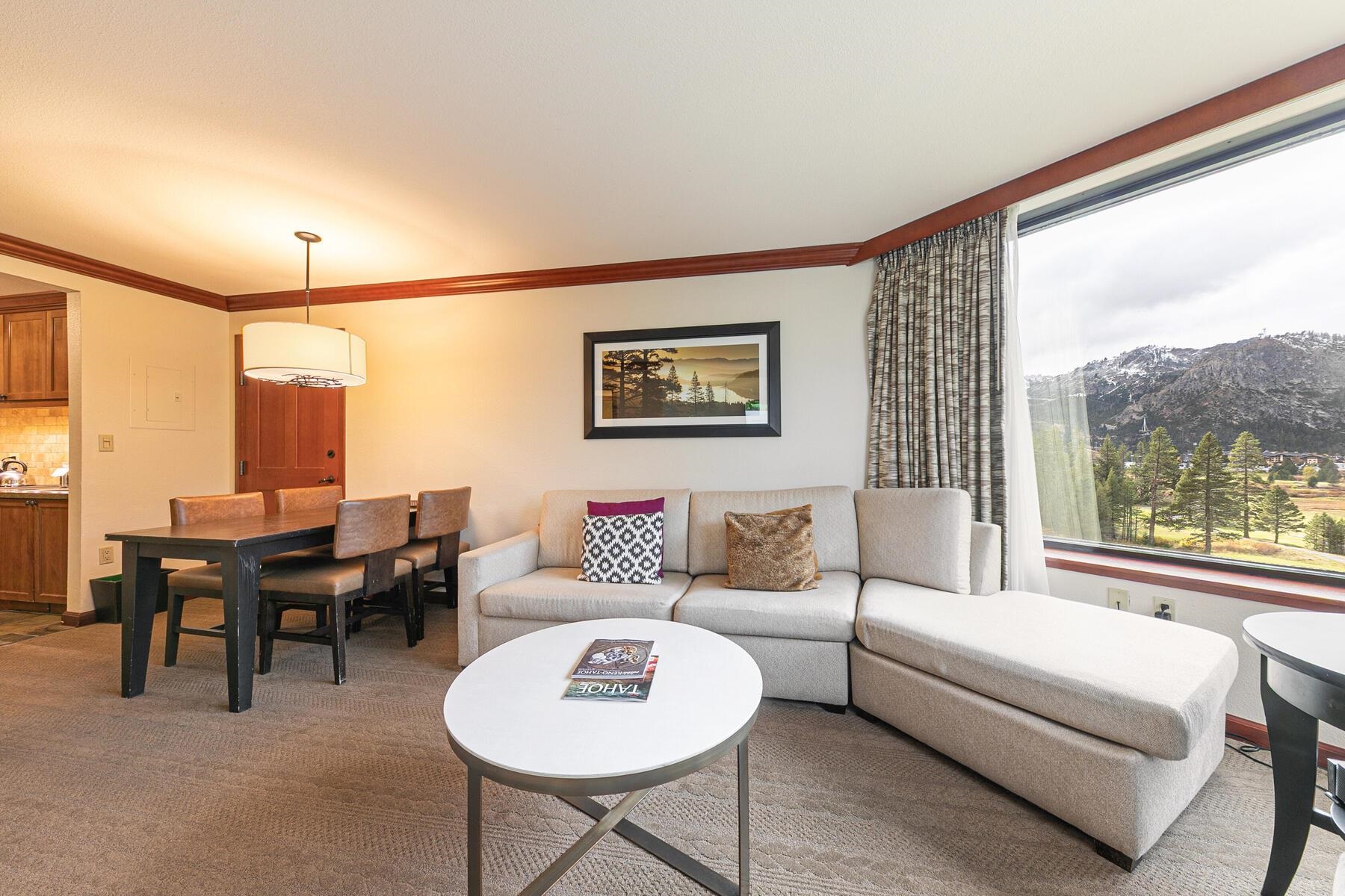 400 Resort Road, Unit 418420 Olympic Valley, CA 96146 - Photo 5 of 26 a living room with furniture and a large window