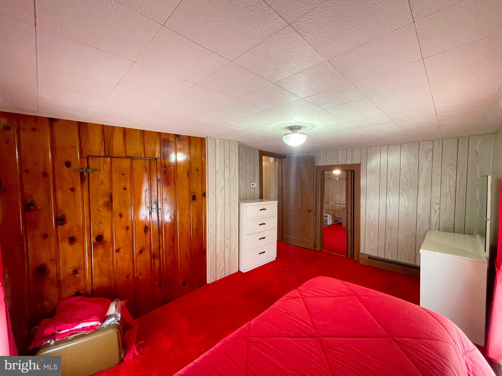 6700 Hungerford Road Bryans Road, MD 20616 - Photo 21 of 36 a bedroom with a bed and a view of bathroom