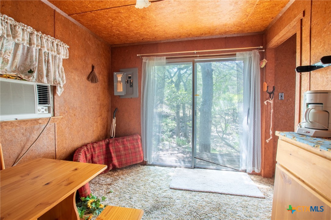 322 Cliff View Road Lampasas, TX 76550 - Photo 16 of 33 a living room with furniture and a large window
