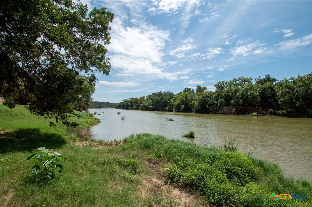 322 Cliff View Road Lampasas, TX 76550 - Photo 23 of 33 a view of a lake with houses in the back