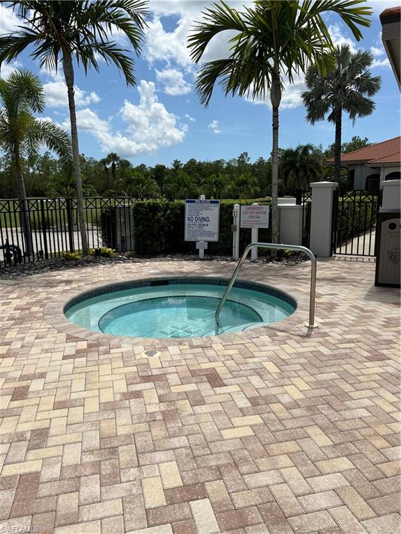 7625 Arbor Lake Court, Unit 332 Naples, FL 34112 - Photo 26 of 26 a view of a backyard with a patio