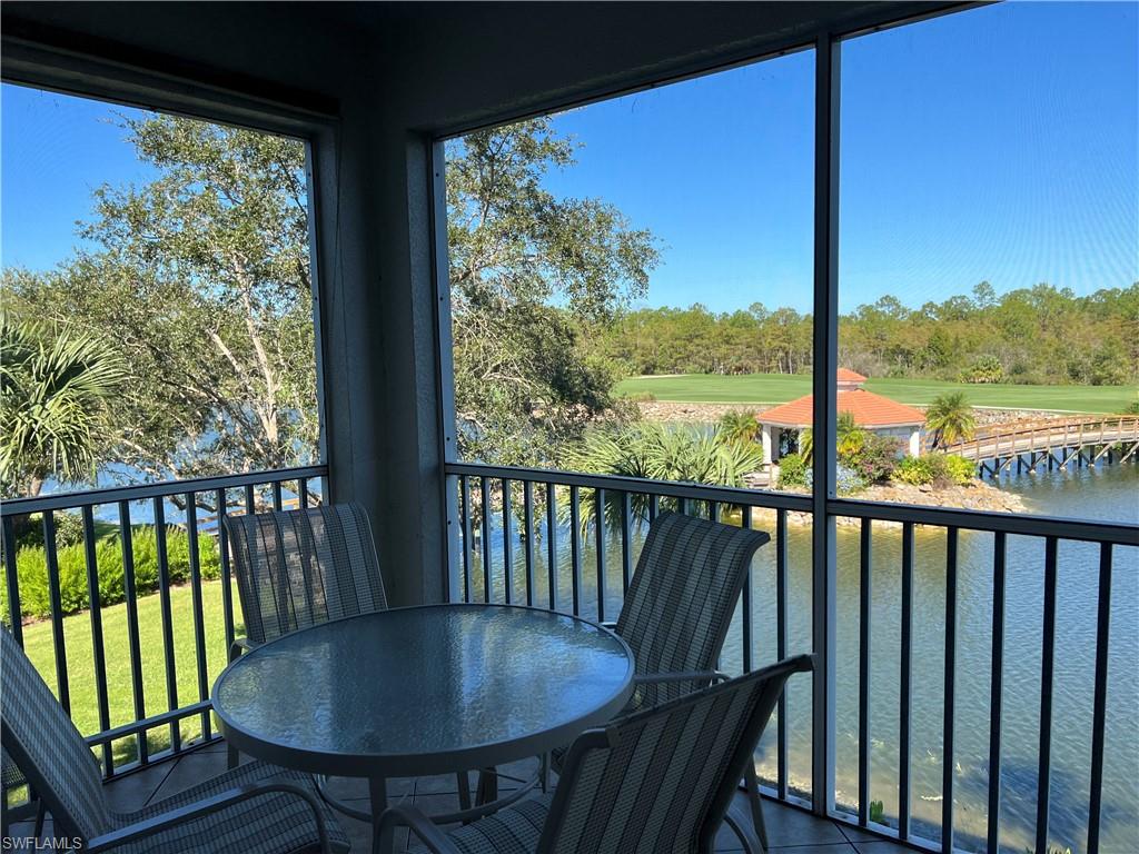 7625 Arbor Lake Court, Unit 332 Naples, FL 34112 - Photo 3 of 26 a view of a chair in wooden deck