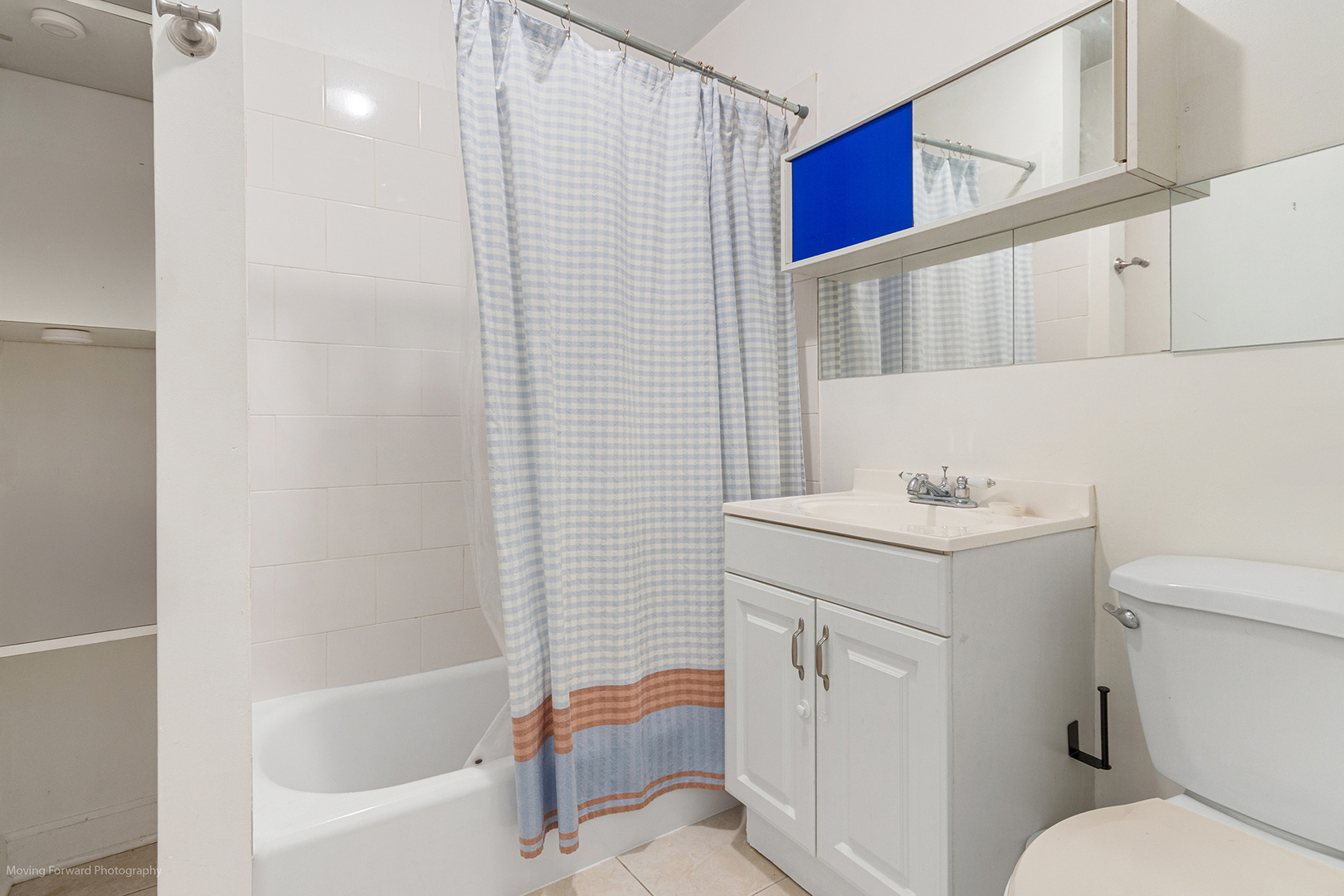 1900 South Throop Street Chicago, IL 60608 - Photo 24 of 42 a bathroom with a sink toilet vanity and bathtub