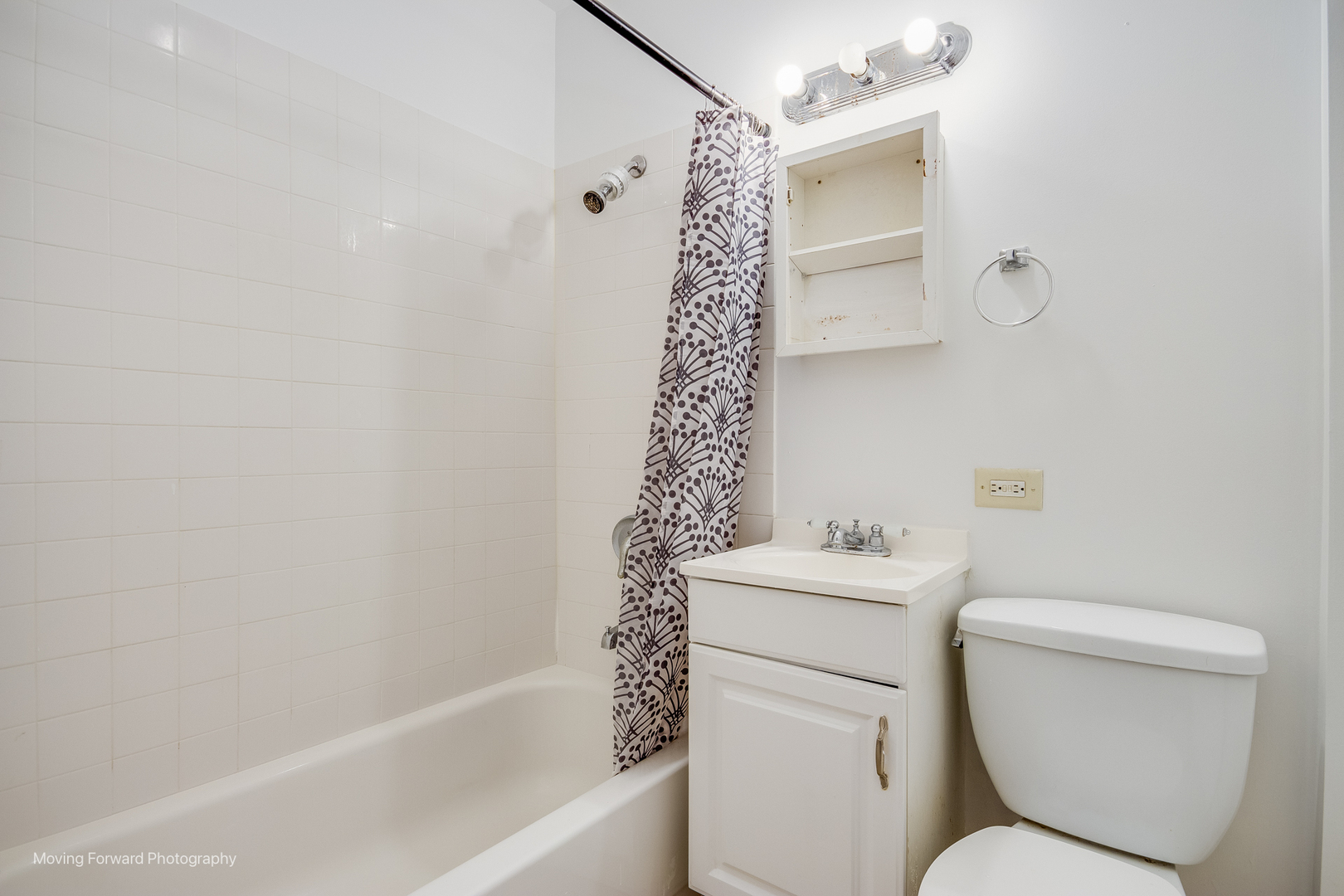 1900 South Throop Street Chicago, IL 60608 - Photo 25 of 42 a bathroom with a sink toilet and shower