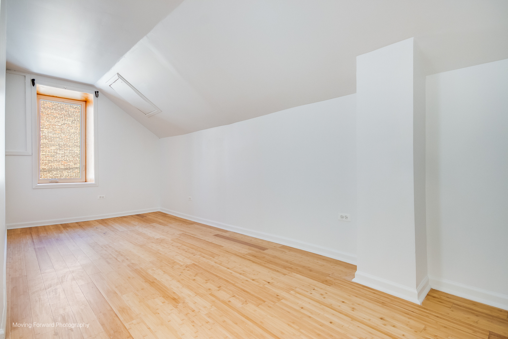 1900 South Throop Street Chicago, IL 60608 - Photo 36 of 42 an empty room with wooden floor and windows