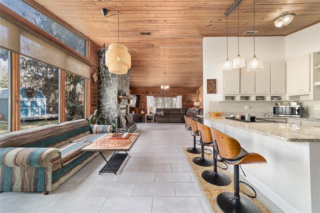 3510 Southwest 5th Court Ocala, FL 34471 - Photo 11 of 44 a living room with patio furniture and a large window
