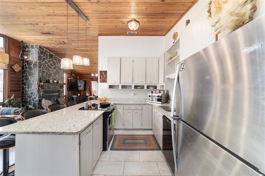 3510 Southwest 5th Court Ocala, FL 34471 - Photo 17 of 44 a kitchen with a sink stainless steel appliances and cabinets