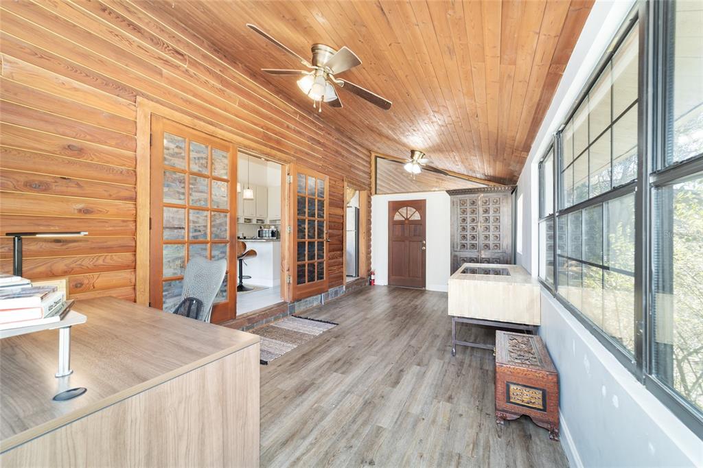 3510 Southwest 5th Court Ocala, FL 34471 - Photo 18 of 44 a view of a living room and kitchen with a large window