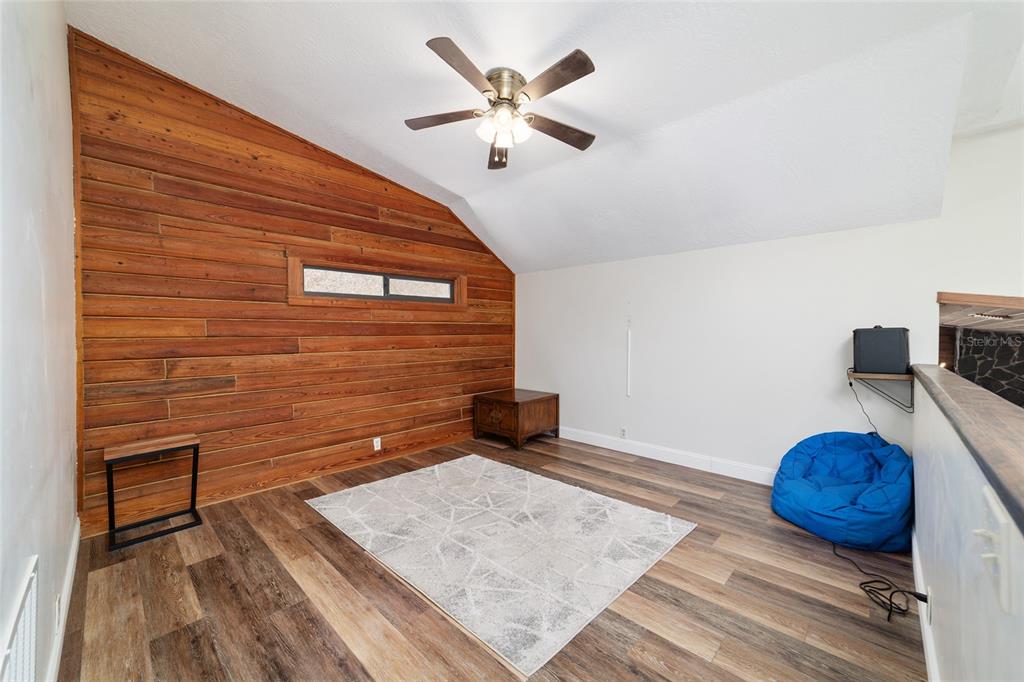3510 Southwest 5th Court Ocala, FL 34471 - Photo 28 of 44 a view of an empty room and wooden floor