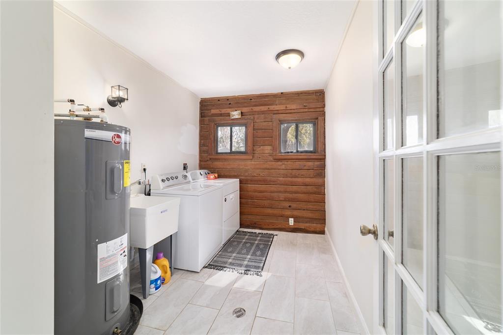 3510 Southwest 5th Court Ocala, FL 34471 - Photo 34 of 44 a bathroom with a sink mirror and a shower