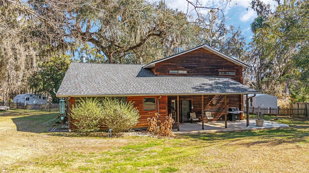 3510 Southwest 5th Court Ocala, FL 34471 - Photo 37 of 44 a view of a house with swimming pool and sitting area