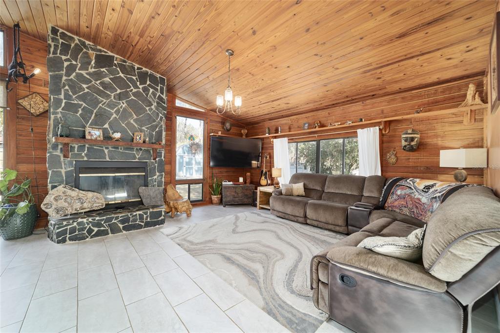 3510 Southwest 5th Court Ocala, FL 34471 - Photo 4 of 44 a living room with furniture and a fireplace