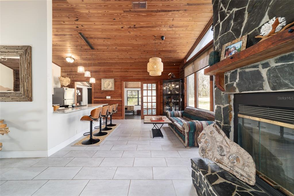 3510 Southwest 5th Court Ocala, FL 34471 - Photo 9 of 44 a living room with furniture and a large window