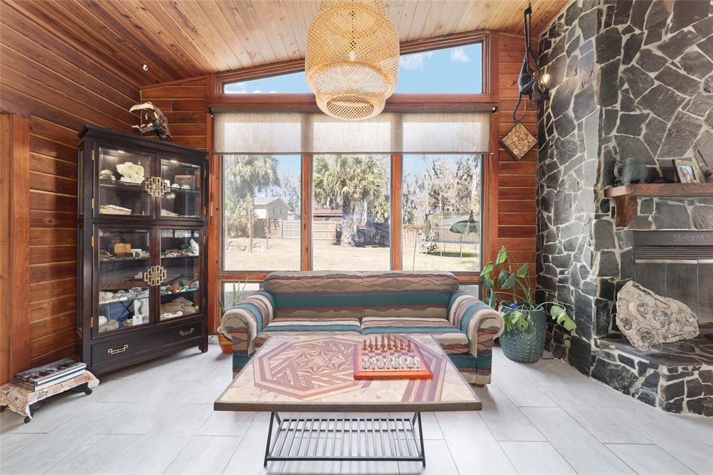 3510 Southwest 5th Court Ocala, FL 34471 - Photo 10 of 44 a living room with furniture a rug and a large window