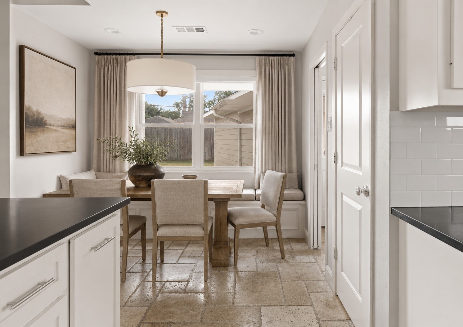 5743 Jason Street Houston, TX 77096 - Photo 14 of 26 Virtually staged Breakfast Room with just furniture, drapery, and accessories.