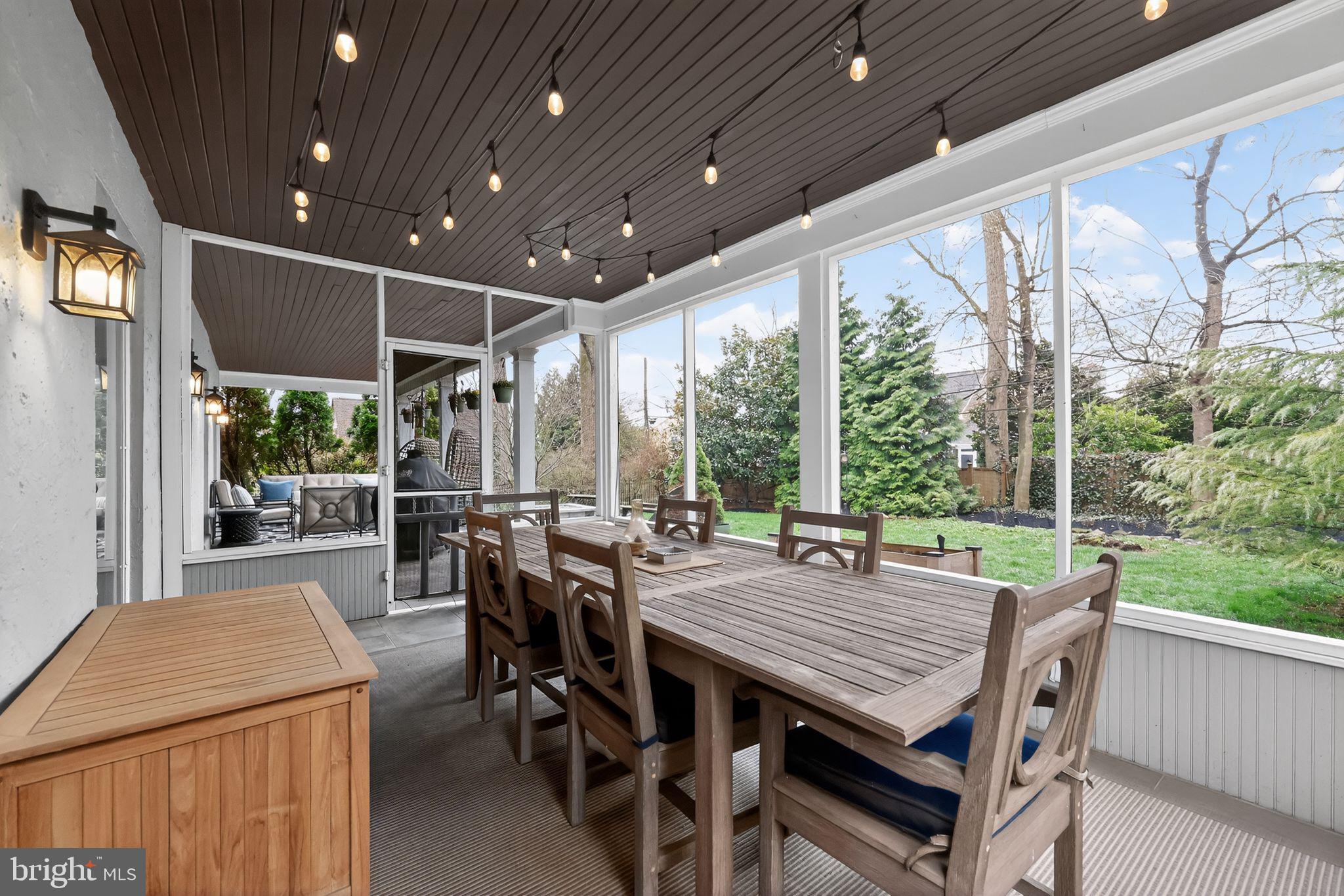 913 Twyckenham Road Media, PA 19063 - Photo 18 of 42 Screened sunroom with pretty lighting