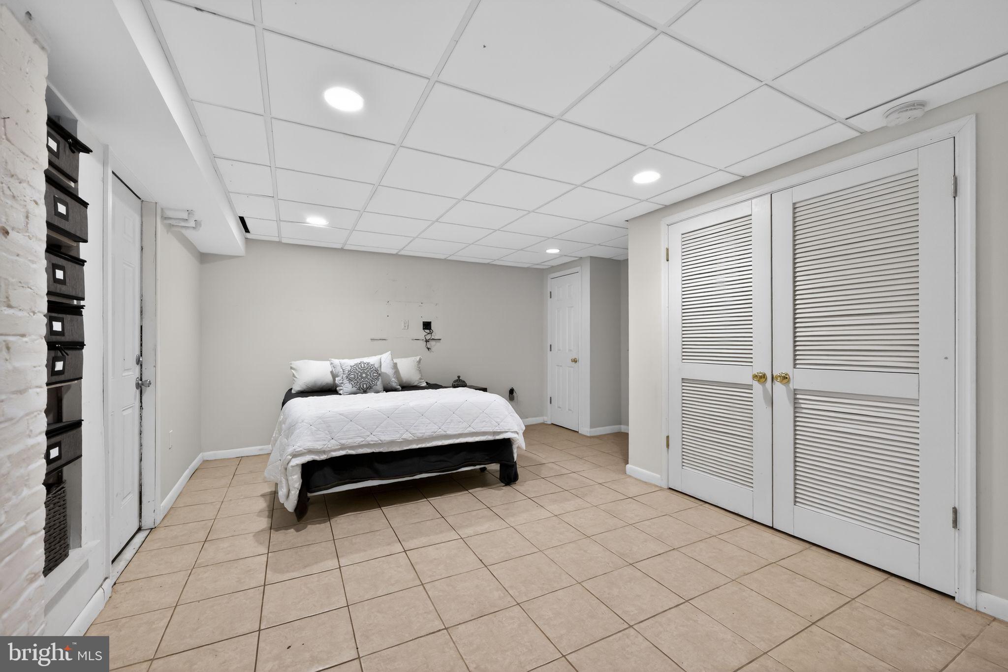 913 Twyckenham Road Media, PA 19063 - Photo 35 of 42 Lower level with tiled room for extra living