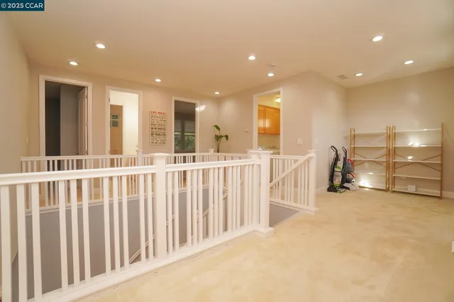 a bathroom with a sink mirror and vanity