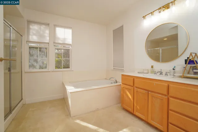 a view of a patio with table and chairs and potted plants