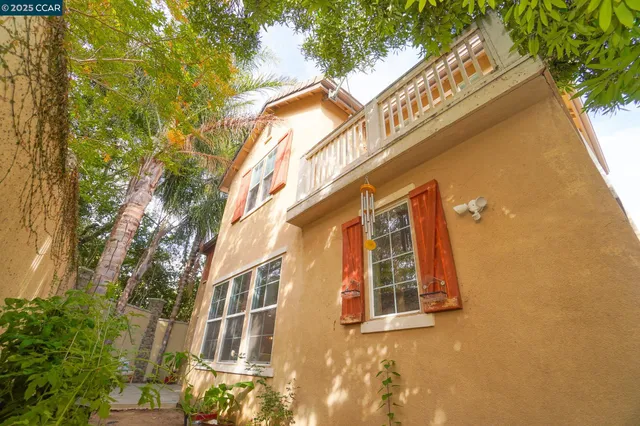 a view of a couches and a patio