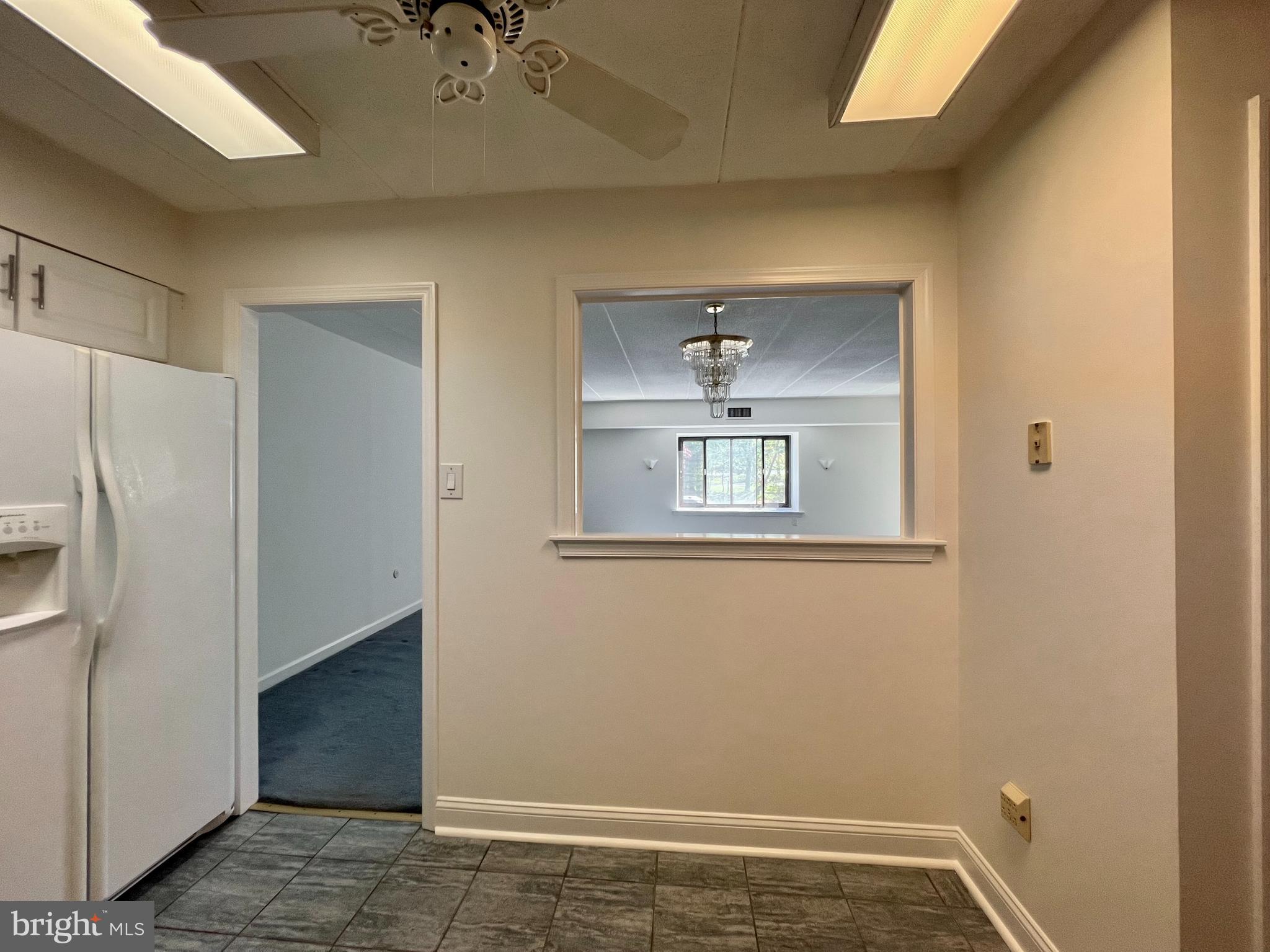 1219 West Wynnewood Road, Unit 206 Wynnewood, PA 19096 - Photo 8 of 24 Kitchen with Opening to Living /Dining Area