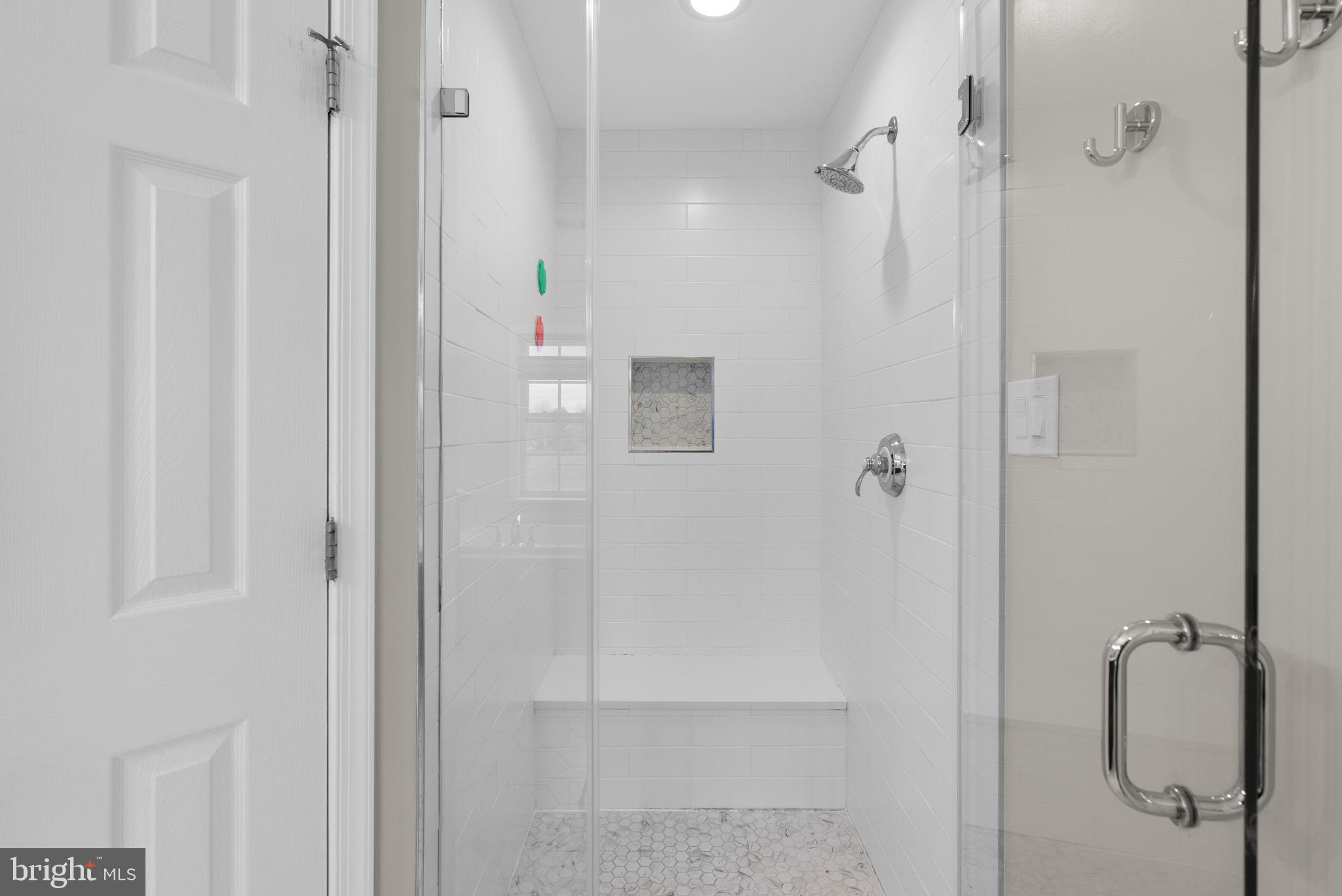 1222 Gaither Road Rockville, MD 20850 - Photo 19 of 42 a bathroom with a shower