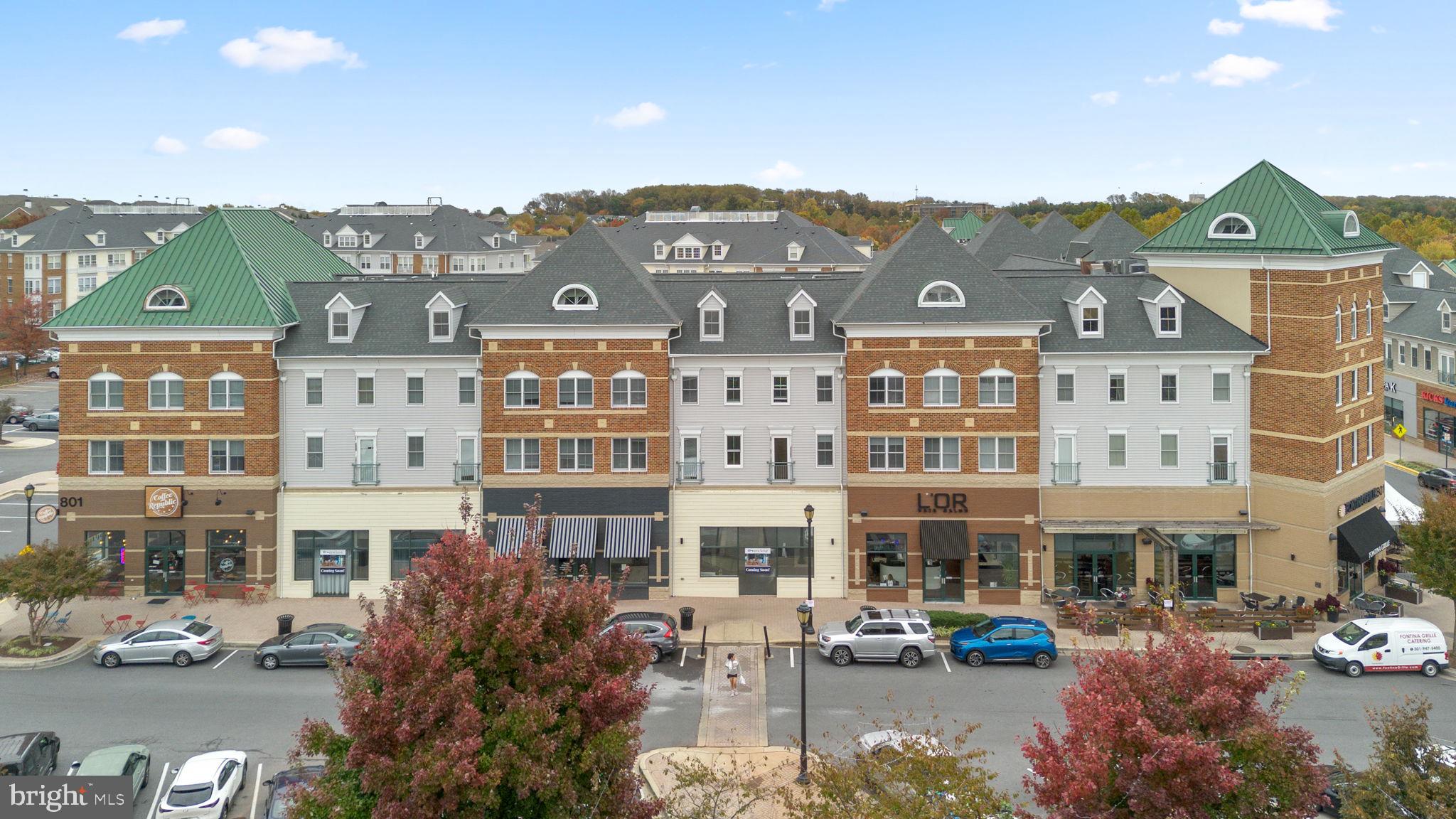 1222 Gaither Road Rockville, MD 20850 - Photo 35 of 42 a front view of a building with streets and trees
