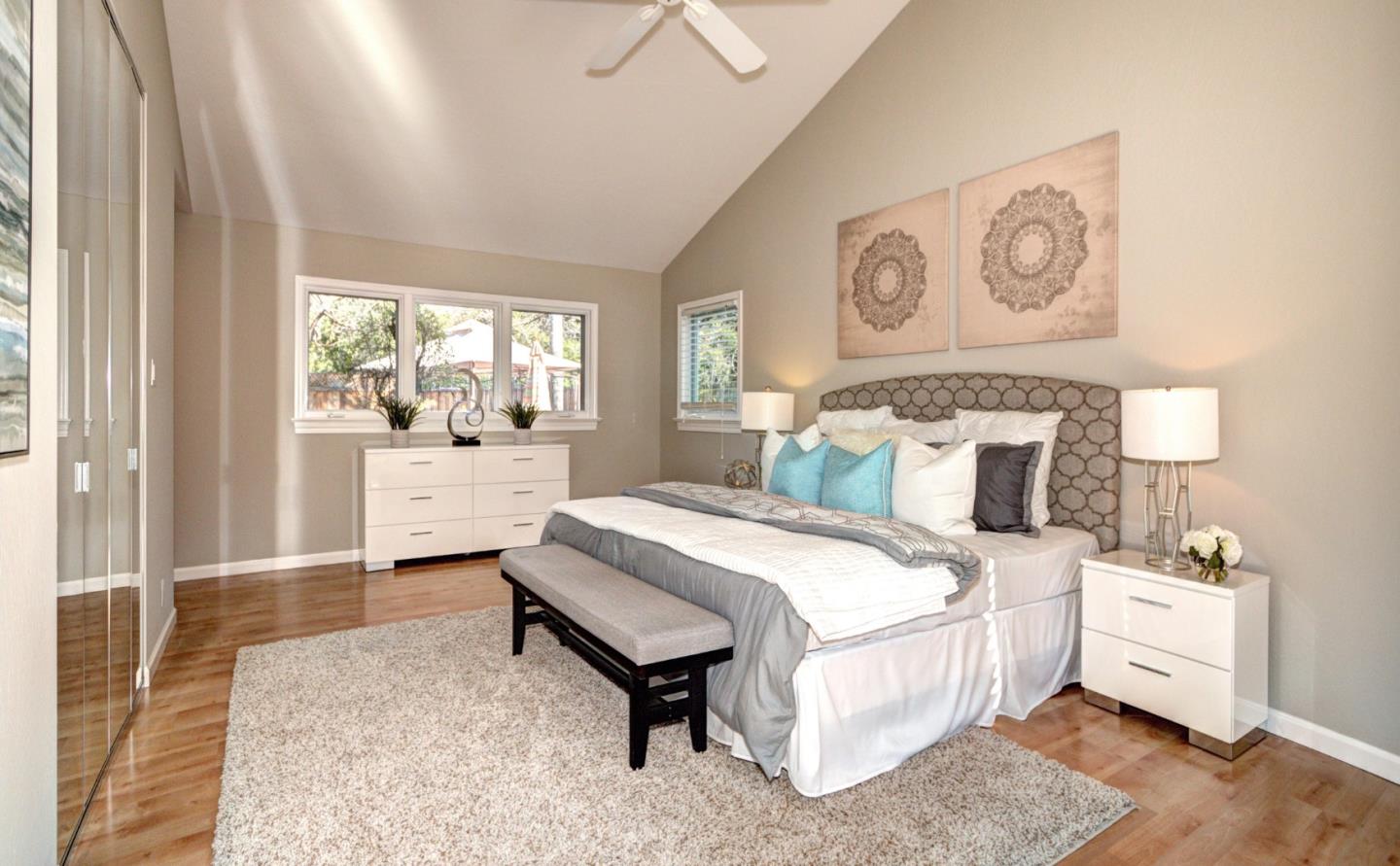 1469 Brookmill Road Los Altos, CA 94024 - Photo 18 of 27 a bedroom with a bed and a table