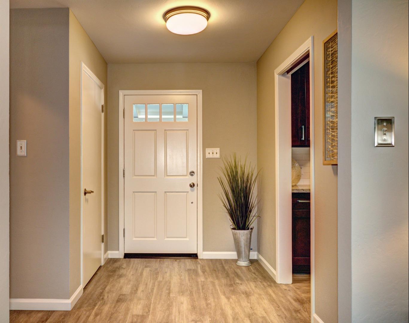 1469 Brookmill Road Los Altos, CA 94024 - Photo 3 of 27 a view of a hallway with wooden floor and closet
