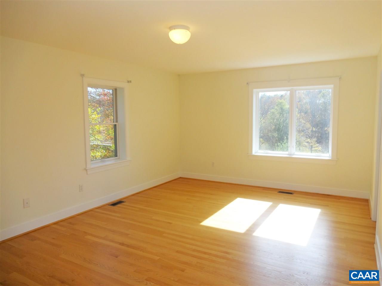 5598 Fitzgerald Road Charlottesville, VA 22903 - Photo 14 of 43 a view of an empty room and window