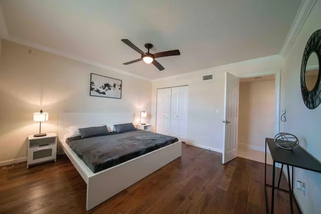 a view of a livingroom with furniture and wooden floor