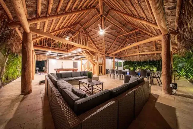 a view of a chairs and table in the patio