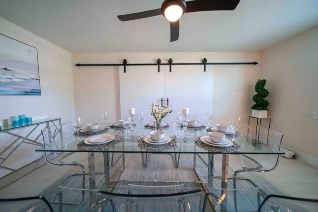 a view of a dining room with furniture