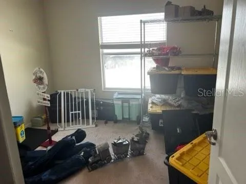 a room with furniture and window