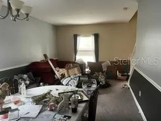 a bed room with furniture and a window