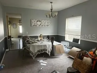 a bed room with a bed and a couch
