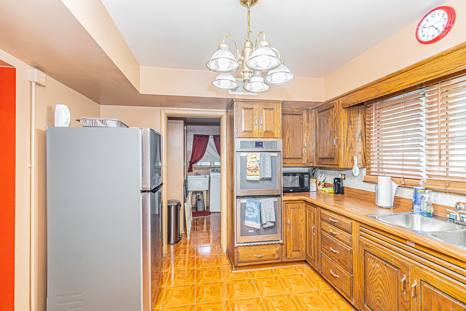 2256 North Home Avenue Park Ridge, IL 60068 - Photo 13 of 40 a kitchen with stainless steel appliances granite countertop a refrigerator and a sink