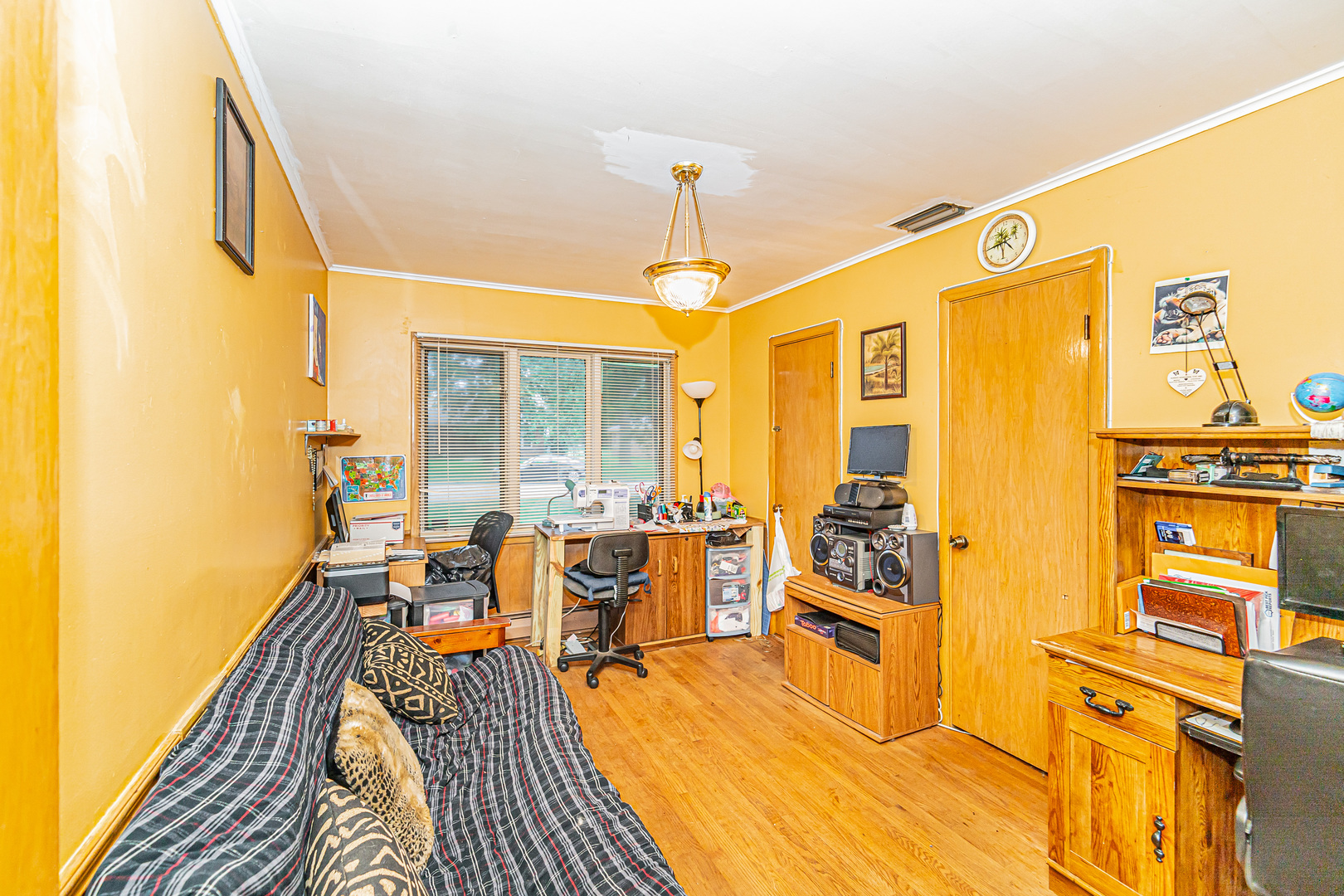 2256 North Home Avenue Park Ridge, IL 60068 - Photo 17 of 40 a living room with couches a dining table and chairs with outer view