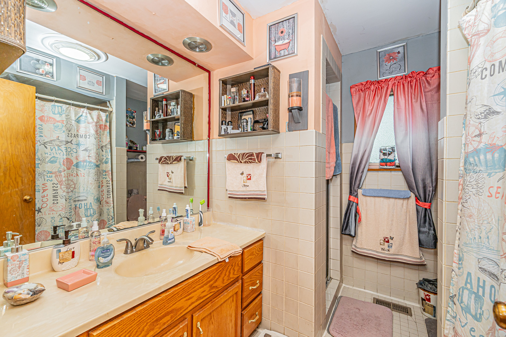 2256 North Home Avenue Park Ridge, IL 60068 - Photo 18 of 40 a bathroom with a double vanity sink and a mirror