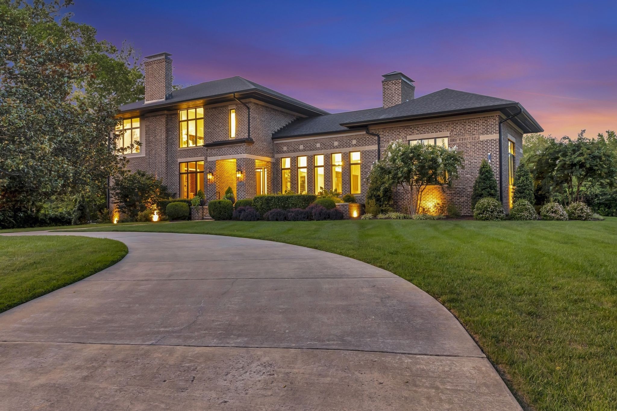 6029 Sedberry Road Nashville, TN 37205 - Photo 1 of 68 a front view of a house with garden