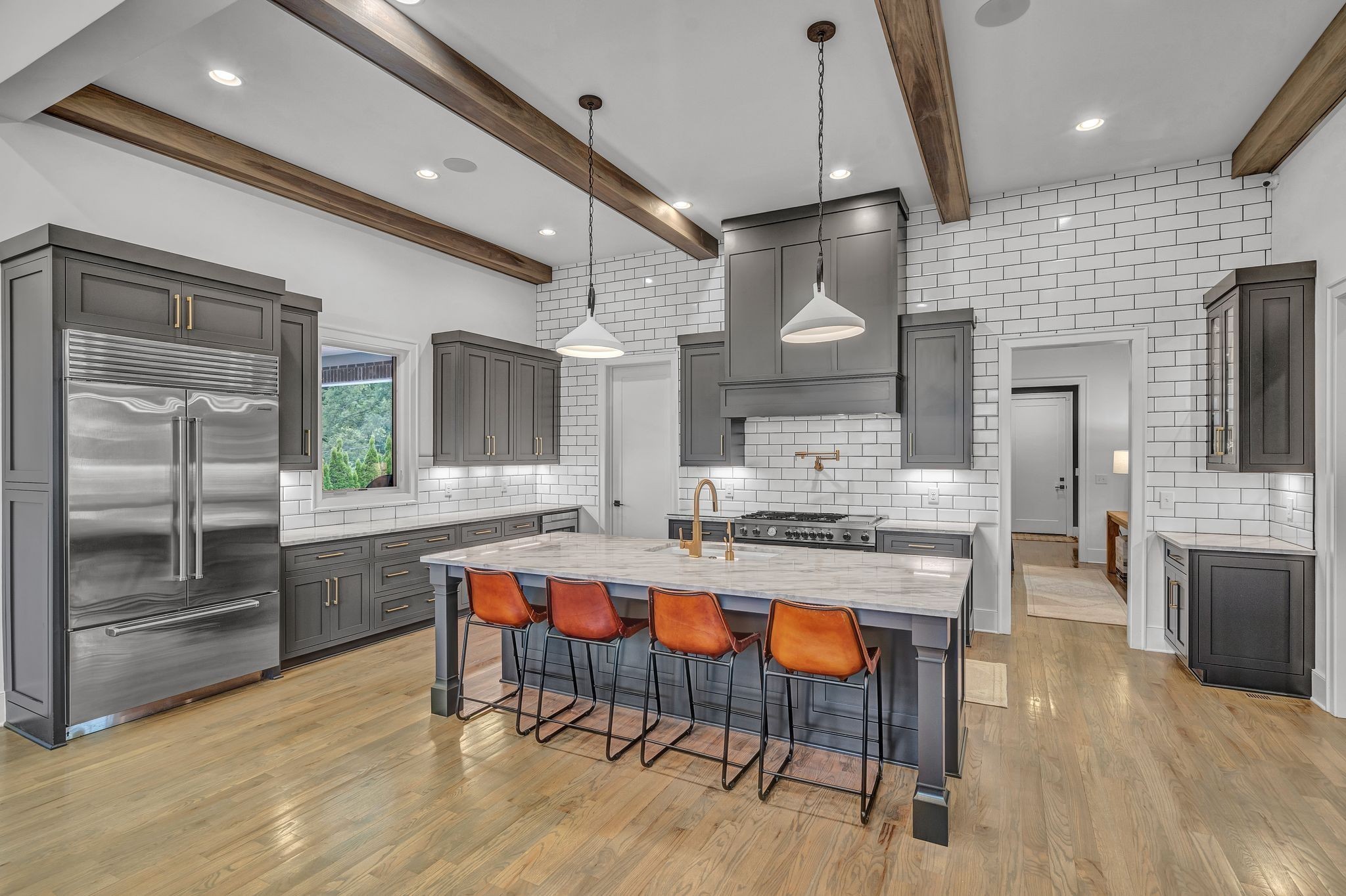 6029 Sedberry Road Nashville, TN 37205 - Photo 19 of 68 a large kitchen with a table and chairs